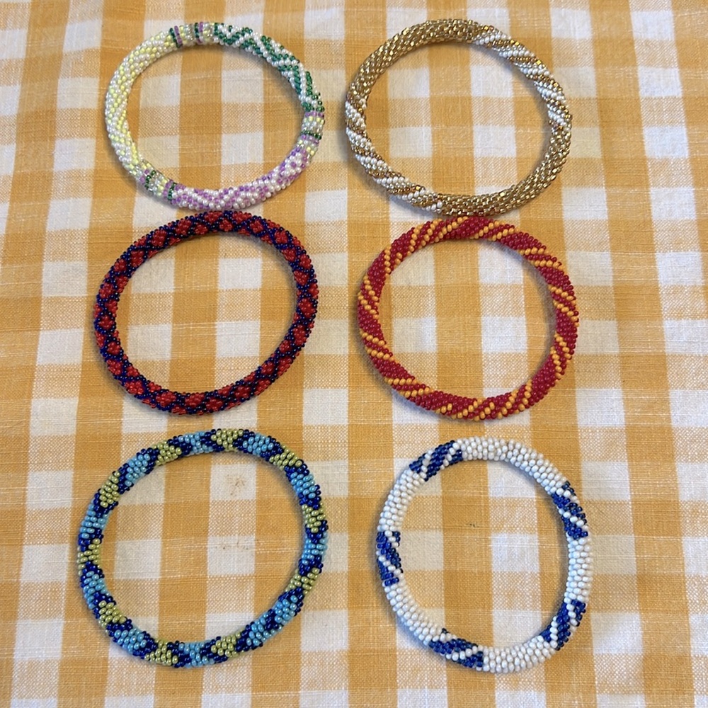 6 roll on bracelets all in great condition.